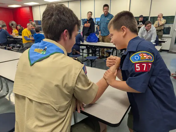 Arm wrestling at a pack meeting